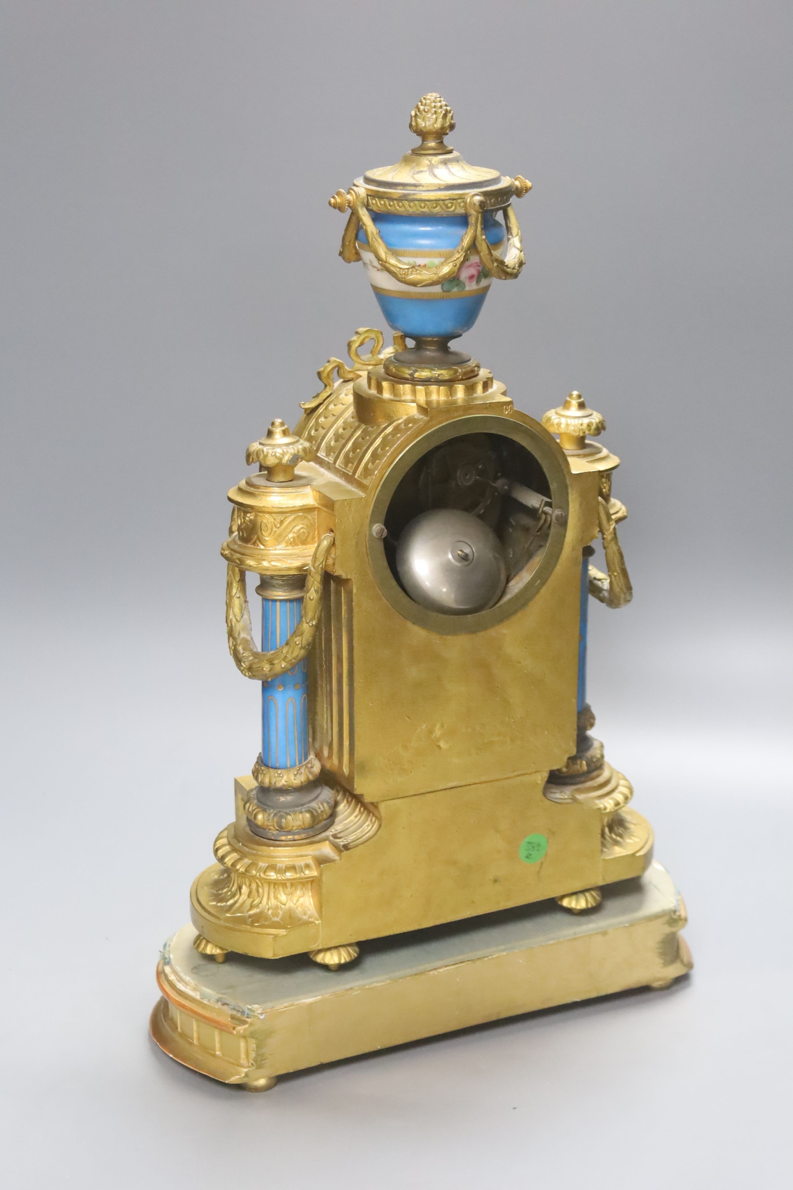 A late 19th century French gilt metal and porcelain mounted mantel clock, Japy freres movement countwheel striking on a bell, on plinth, height 44cm